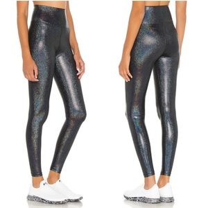 BEACH RIOT hologram shine leggings. Size M.
